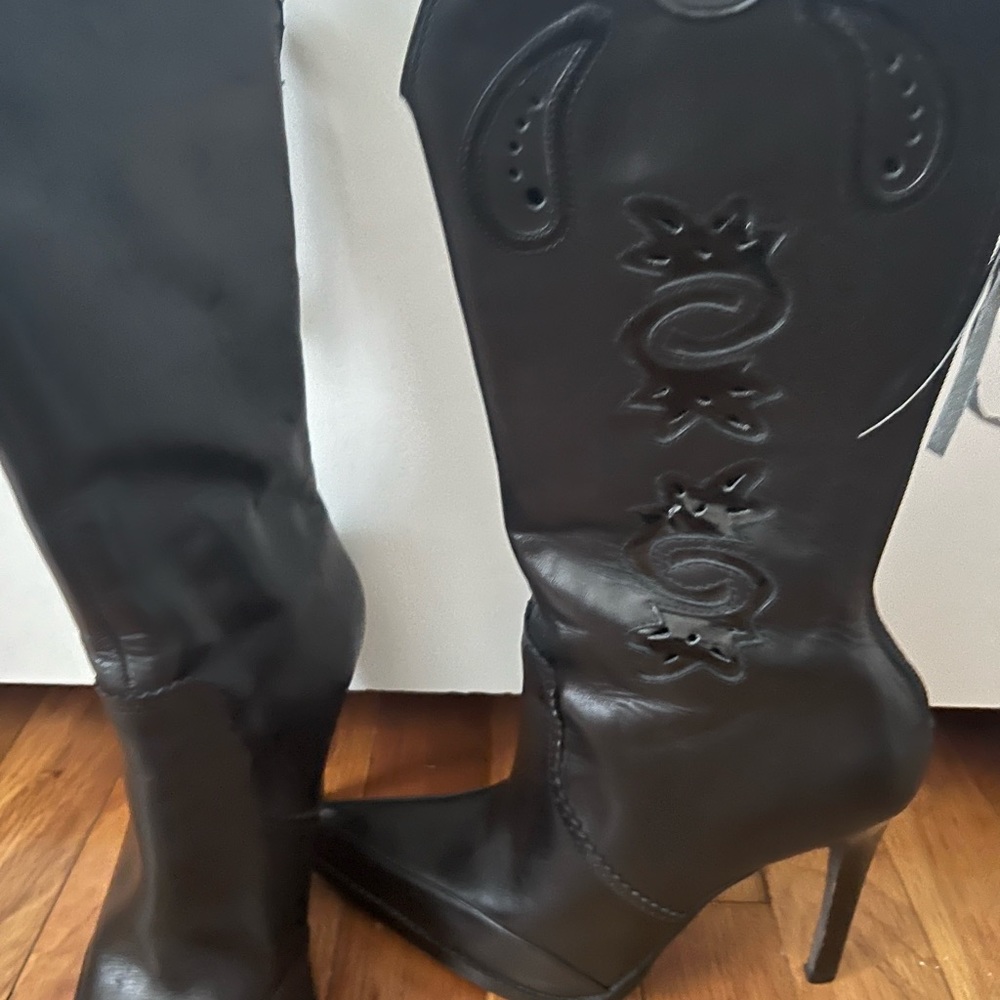 Black cowboy style boots with 4inch heel.